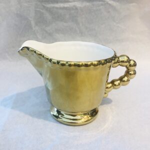 Lattiera oro Castle Memento