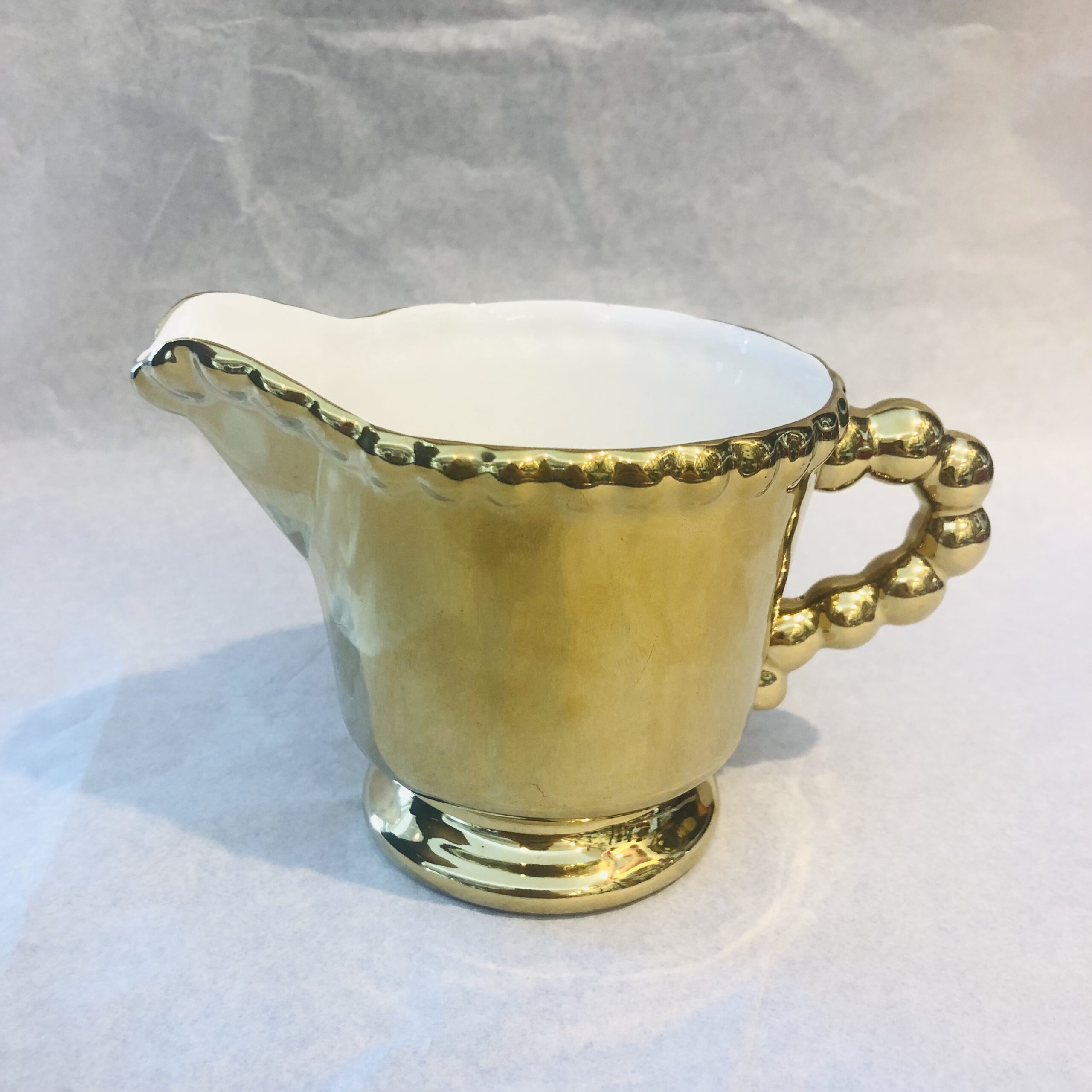 Lattiera oro Castle Memento