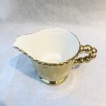 Lattiera oro Castle Memento